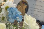 Child's memorial with flowers